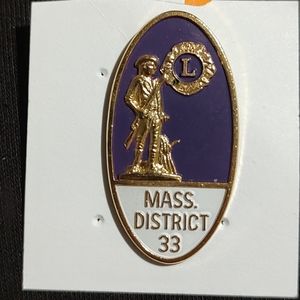 This BA.Ballou mfg pin features the Lions Club logo Mass District 33 Vintage